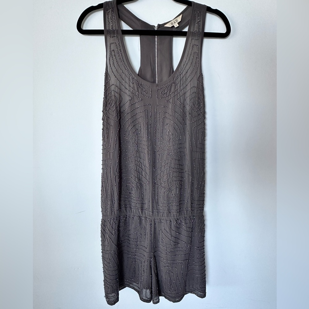 Gray romper with sequins. Size 10